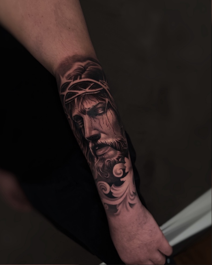 Crown of thorns: Forearm, second session, face healed. Tattoo by Vik.