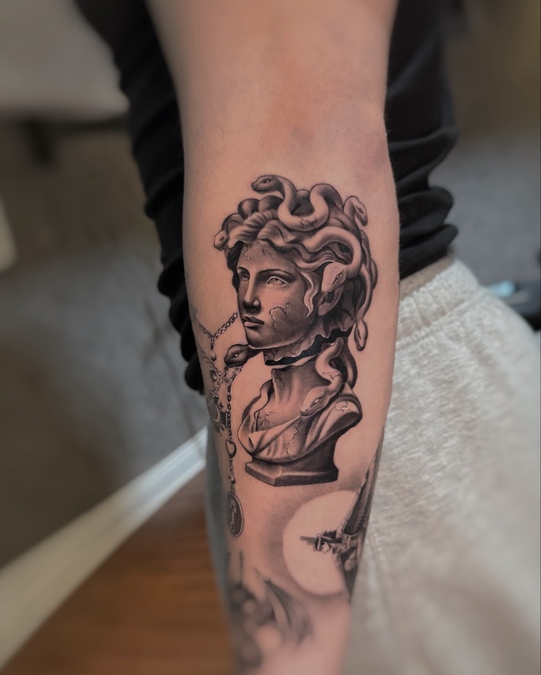 Medusa: Part of a realism patchwork sleeve. Tattoo by Vik.